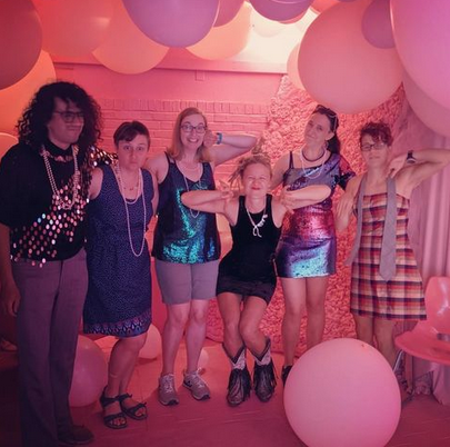 the band with big pink balloons